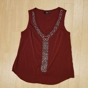 Maroon cami with beading detail.